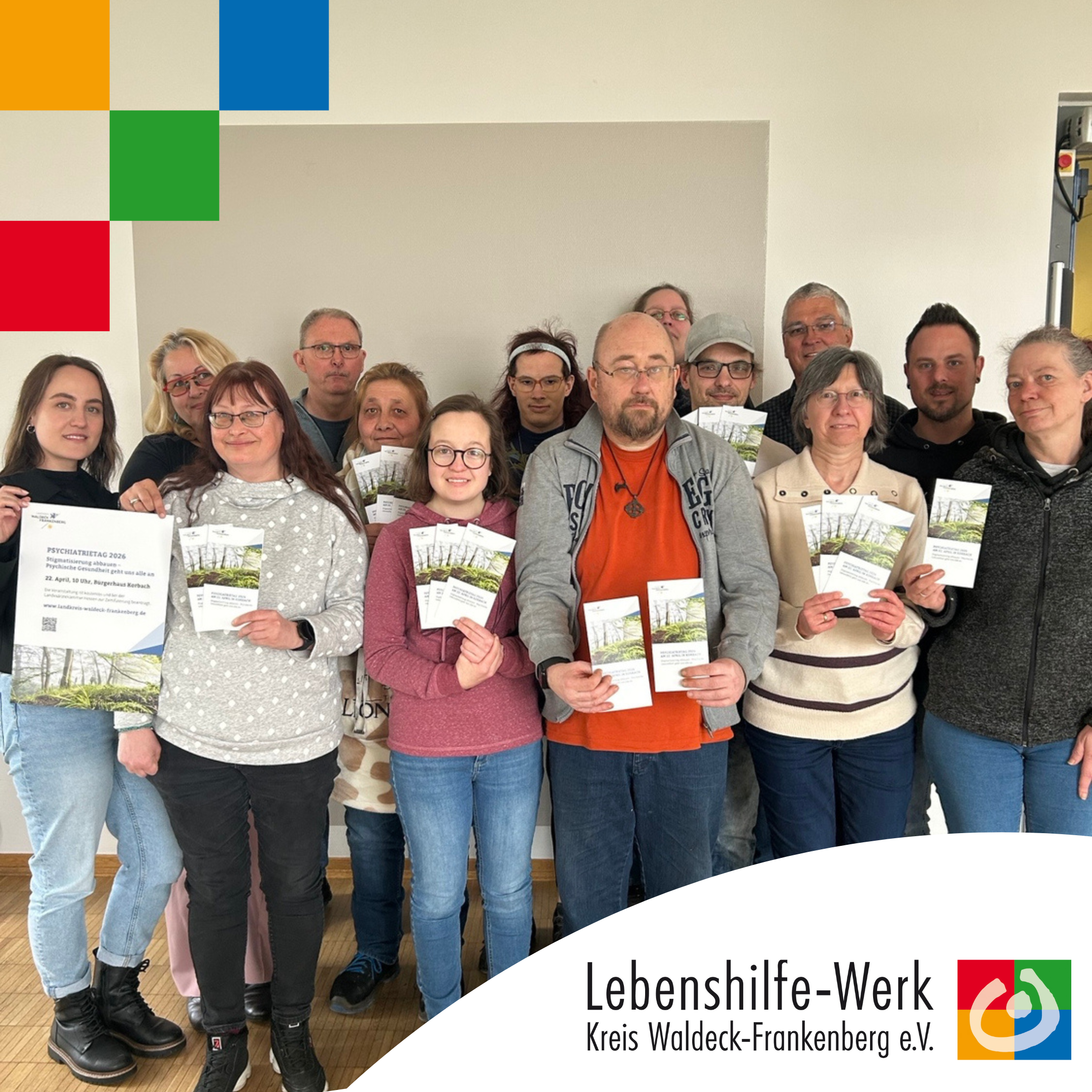 Bild mit Klienten die Prospekte vom Psychiatrietag 2026.